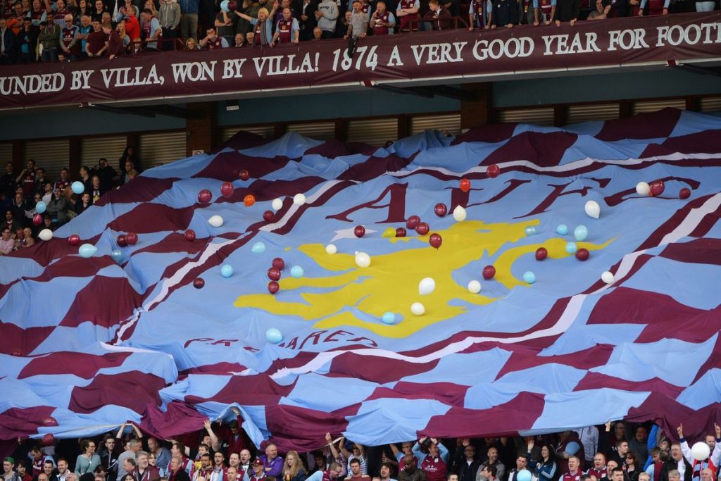 Aston_Villa_fans_display_a_club_flag.0